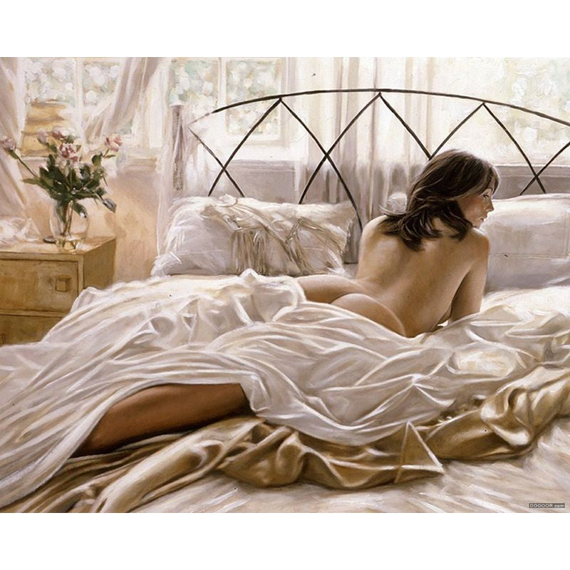 Frau auf dem Bett