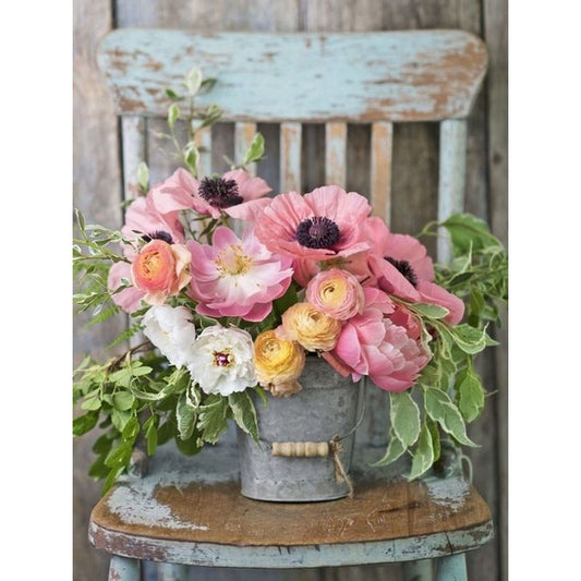 Blumen auf Stuhl